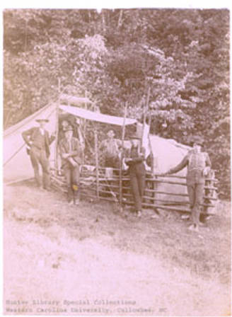 Kephart's first classroom in the Smokies.  The fence was to keep wild hogs out.  The smaller canvas structure to the right was his pantry. (Photo: Hunter Library, Western Carolina University, Collowhee, NC)