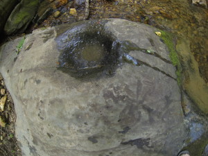 Pestle in boulder along a tributary of Etowah River in North Georgia.  Perhaps ancient?