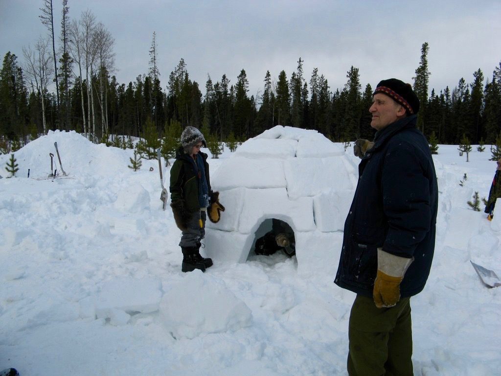 Here, Mors is instructing on how to make a proper igloo. Mors has instructed over 50,000 children in his 40 years of teaching.